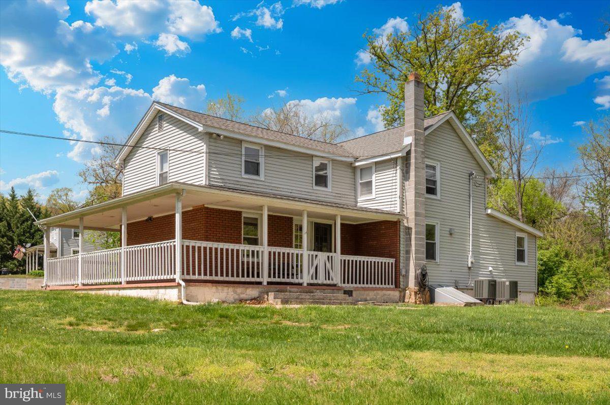 7010 Old Pryor Road Thurmont, MD 21788 - Photo 34 of 62 a view of a house with a backyard