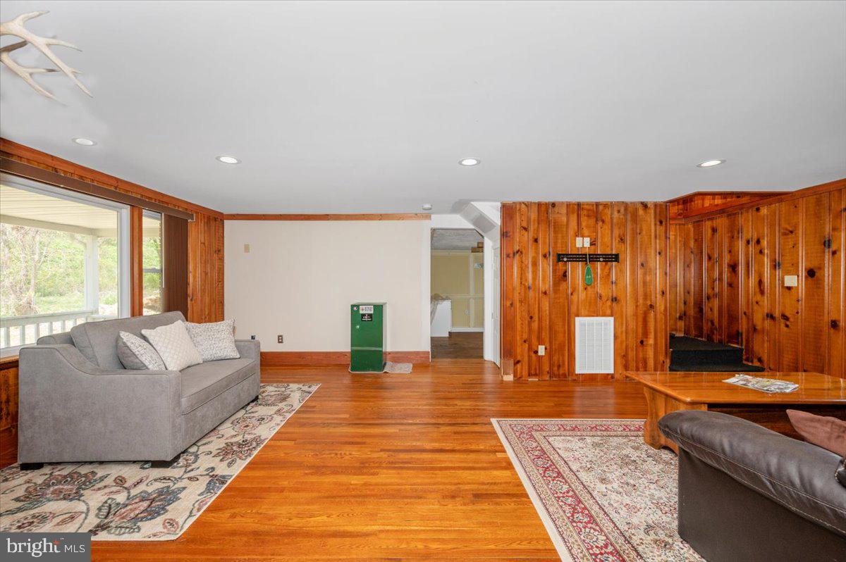 7010 Old Pryor Road Thurmont, MD 21788 - Photo 5 of 62 a living room with furniture rug and wooden floor