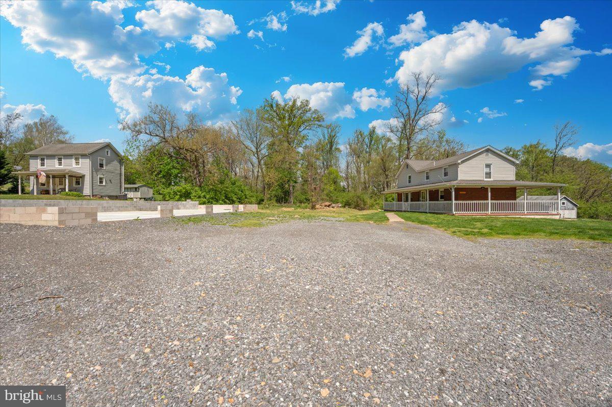 7010 Old Pryor Road Thurmont, MD 21788 - Photo 54 of 62 a view of a house with a big yard and large trees