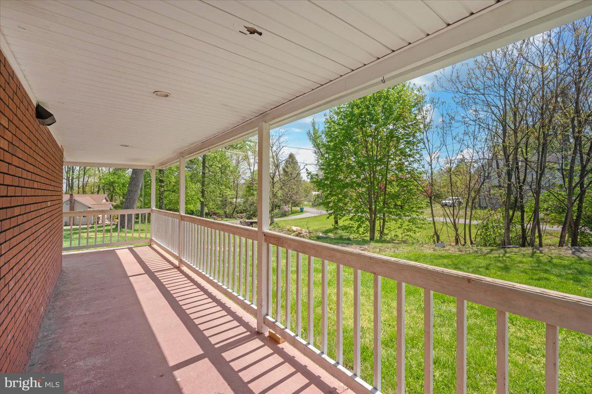 7010 Old Pryor Road Thurmont, MD 21788 - Photo 57 of 62 a view of a balcony with wooden floor