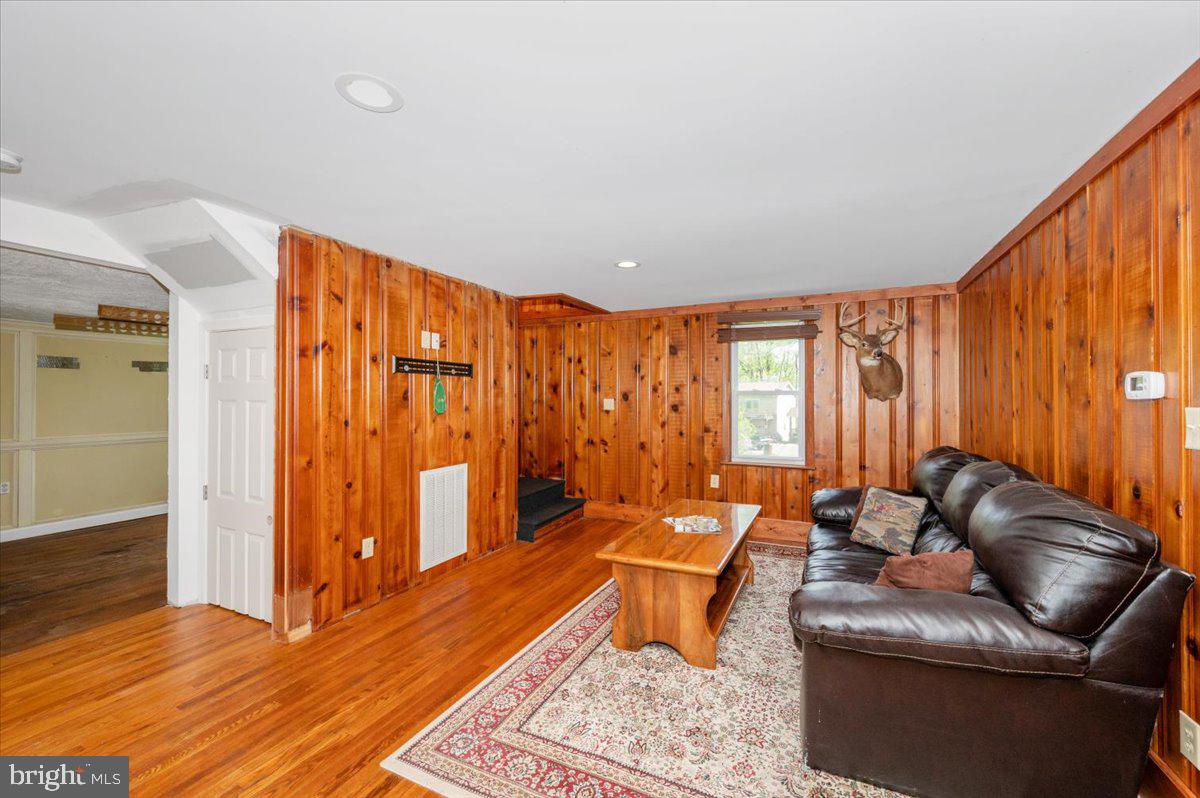 7010 Old Pryor Road Thurmont, MD 21788 - Photo 6 of 62 a living room with furniture and a large window