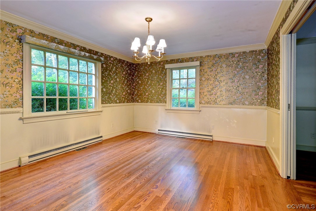 102 Wake Robin Road Williamsburg, VA 23185 - Photo 10 of 35 a view of an empty room with wooden floor and a window