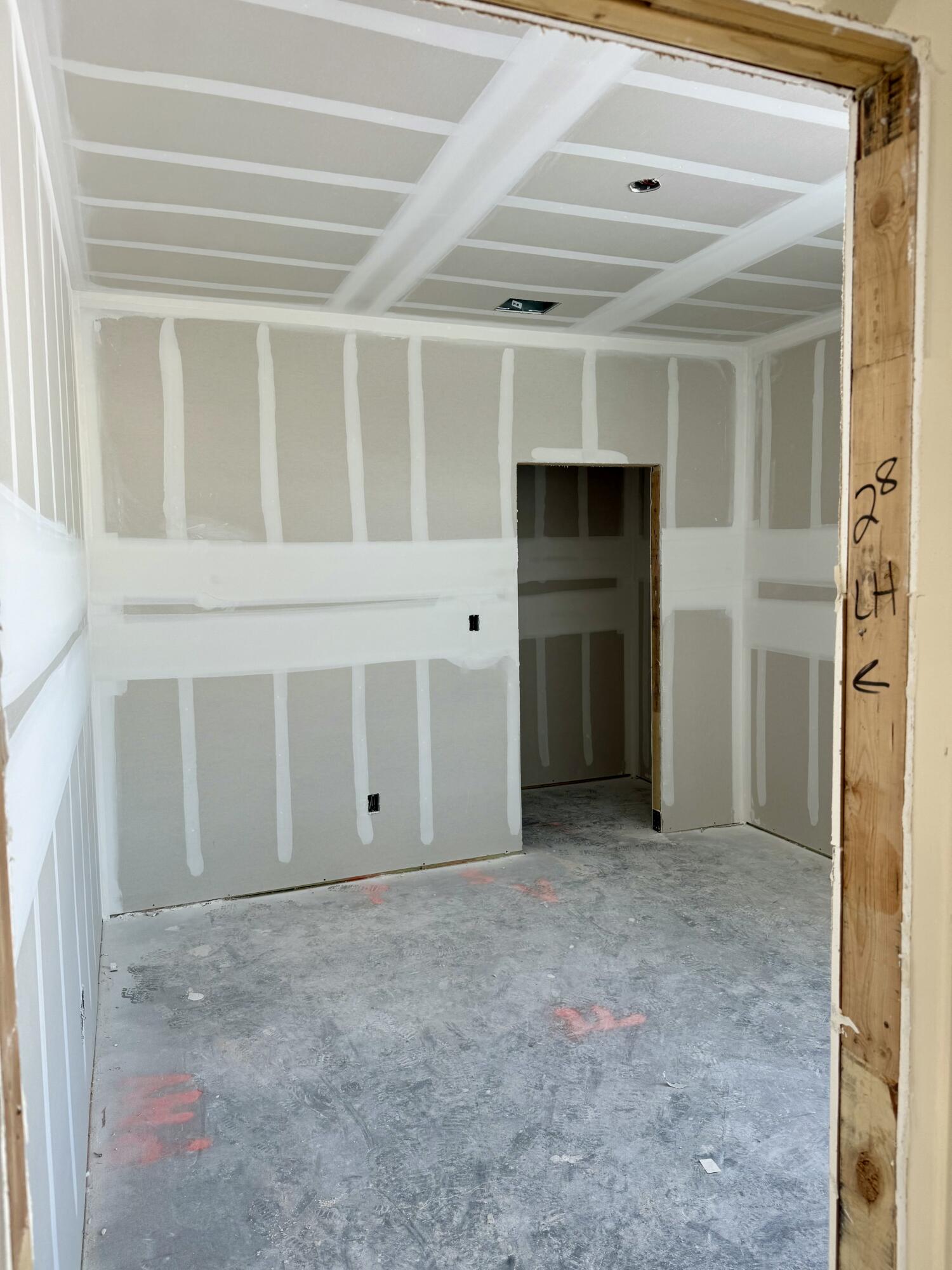 7524 58th Street Lubbock, TX 79407 - Photo 3 of 5 a view of an empty room with a fireplace and a window
