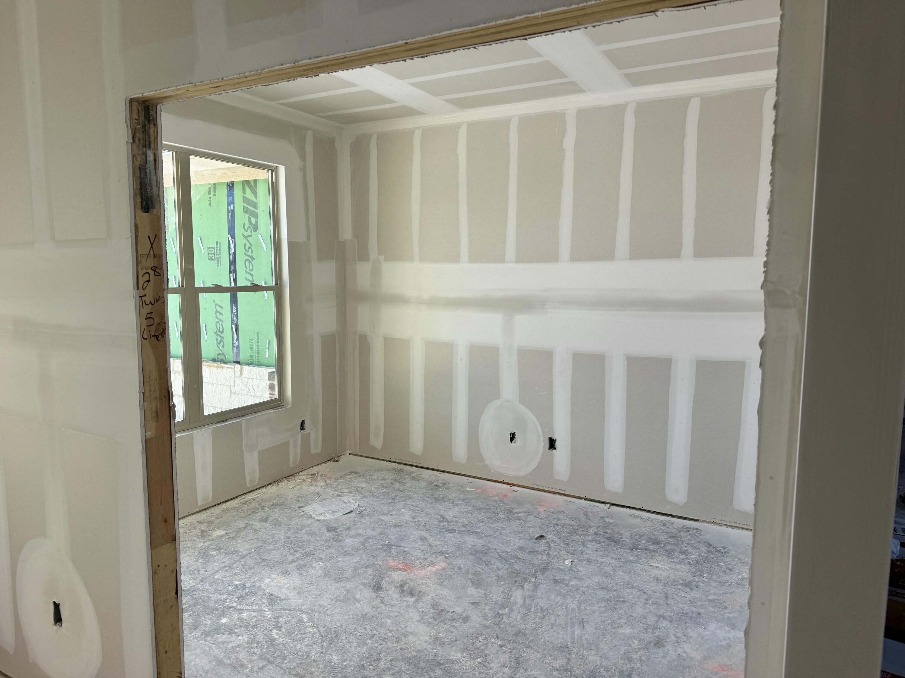 7524 58th Street Lubbock, TX 79407 - Photo 6 of 6 a view of an empty room with a window