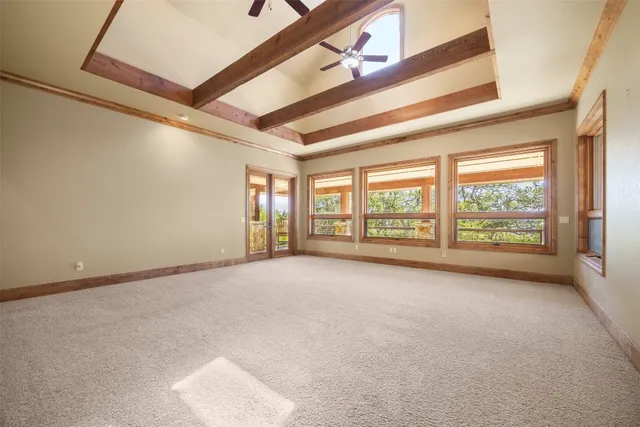 a view of walk in closet and window