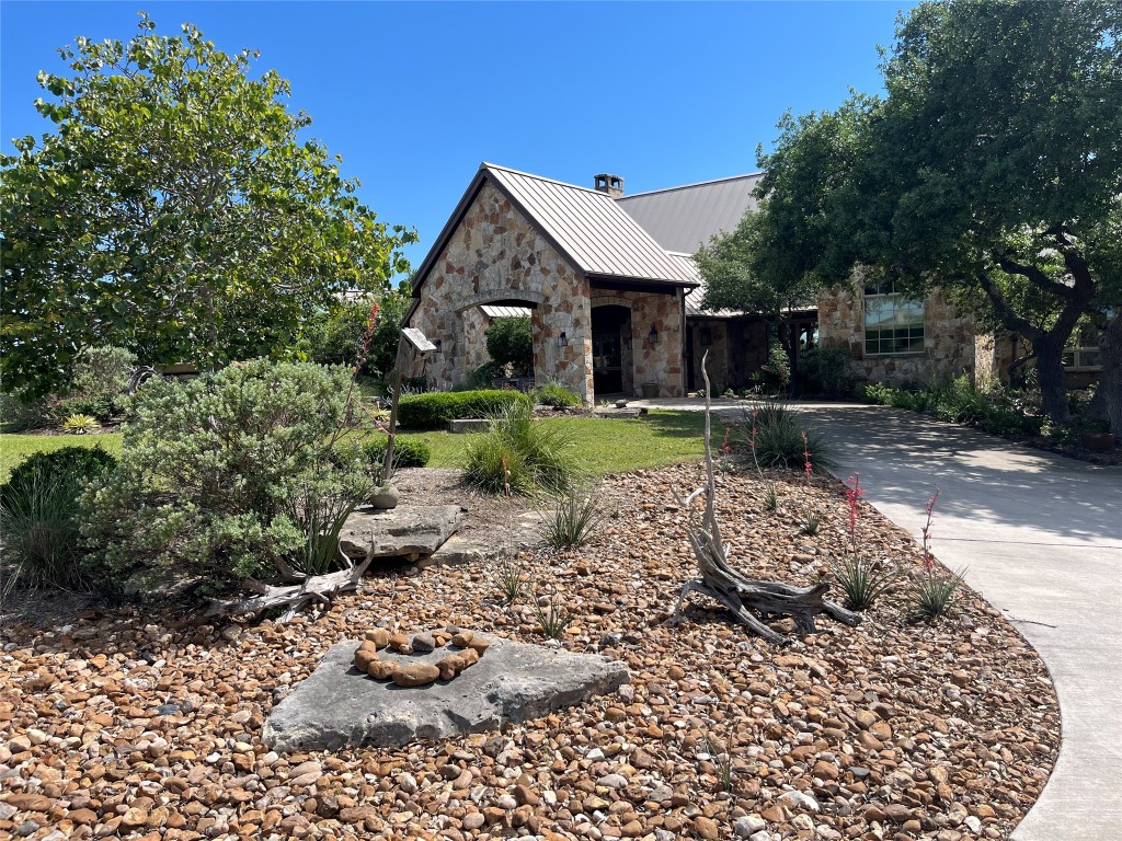 470 Inspiration Trail Wimberley, TX 78676 - Photo 2 of 30 a front view of a house with a yard