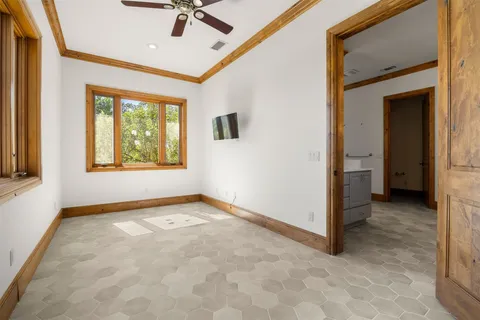an aerial view of a house with garden space sitting space and swimming pool