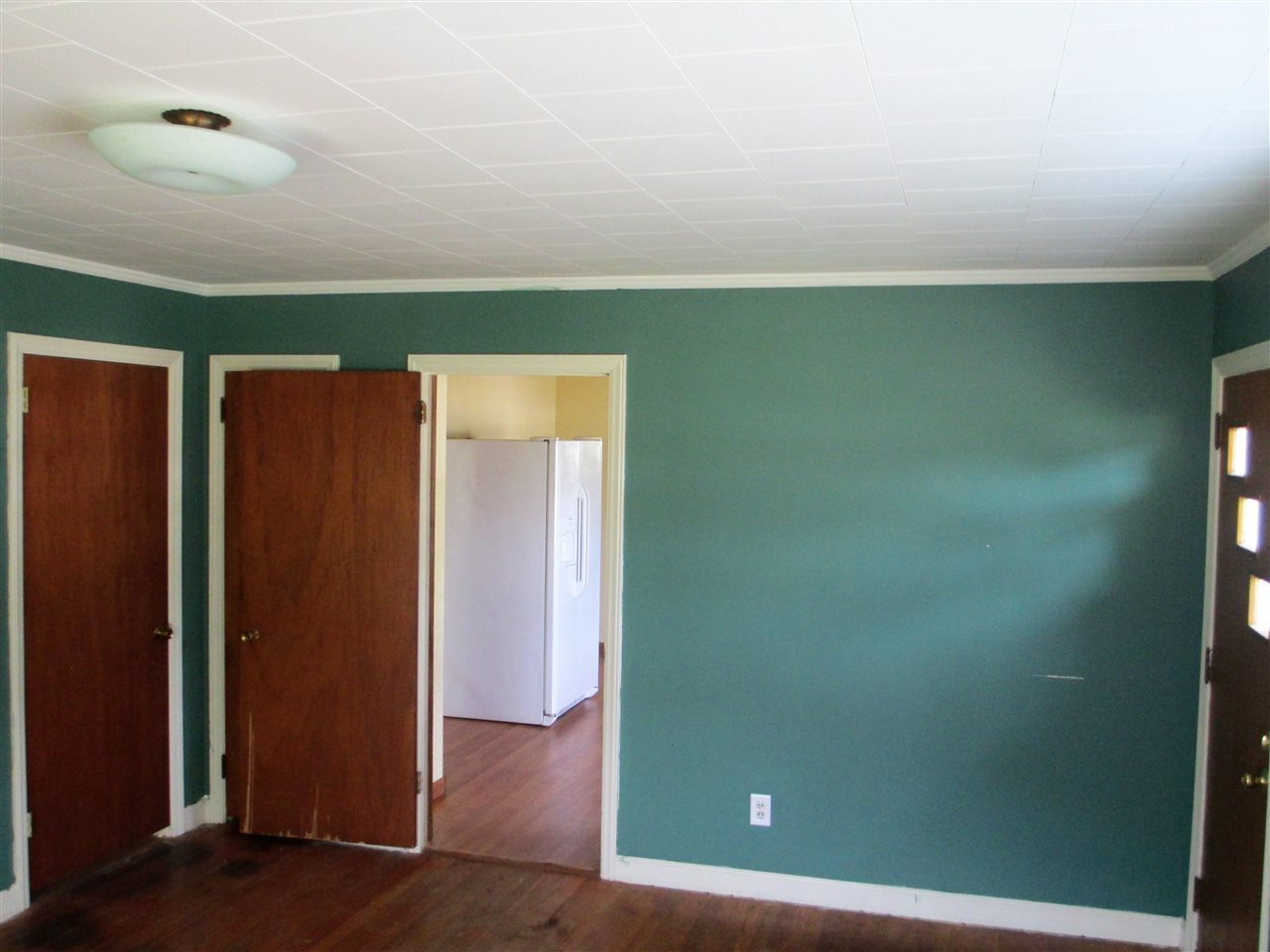 1200 White Memorial Church Road Willow Spring, NC 27592 - Photo 12 of 25 Living Room View 2,back hallway door, closet and open door to kitchen! Living Room