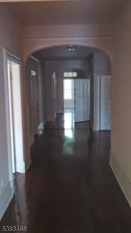 a view of gallery with wooden floor