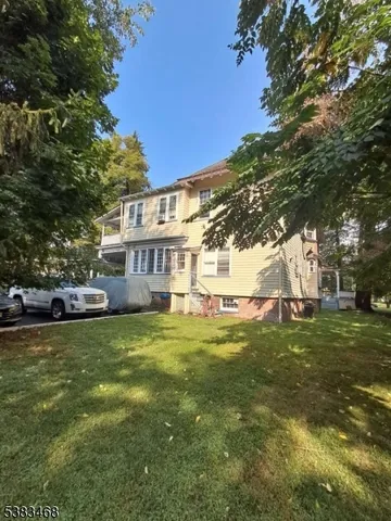 a view of a house with a big yard
