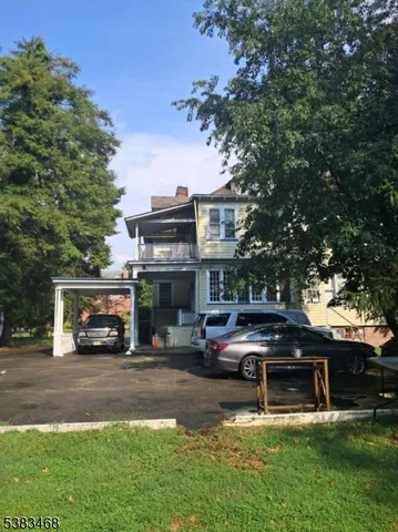 a car parked in front of the house