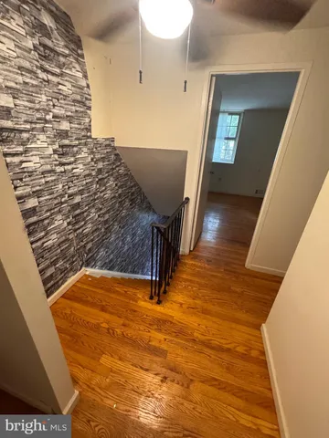 a view of entryway with wooden floor