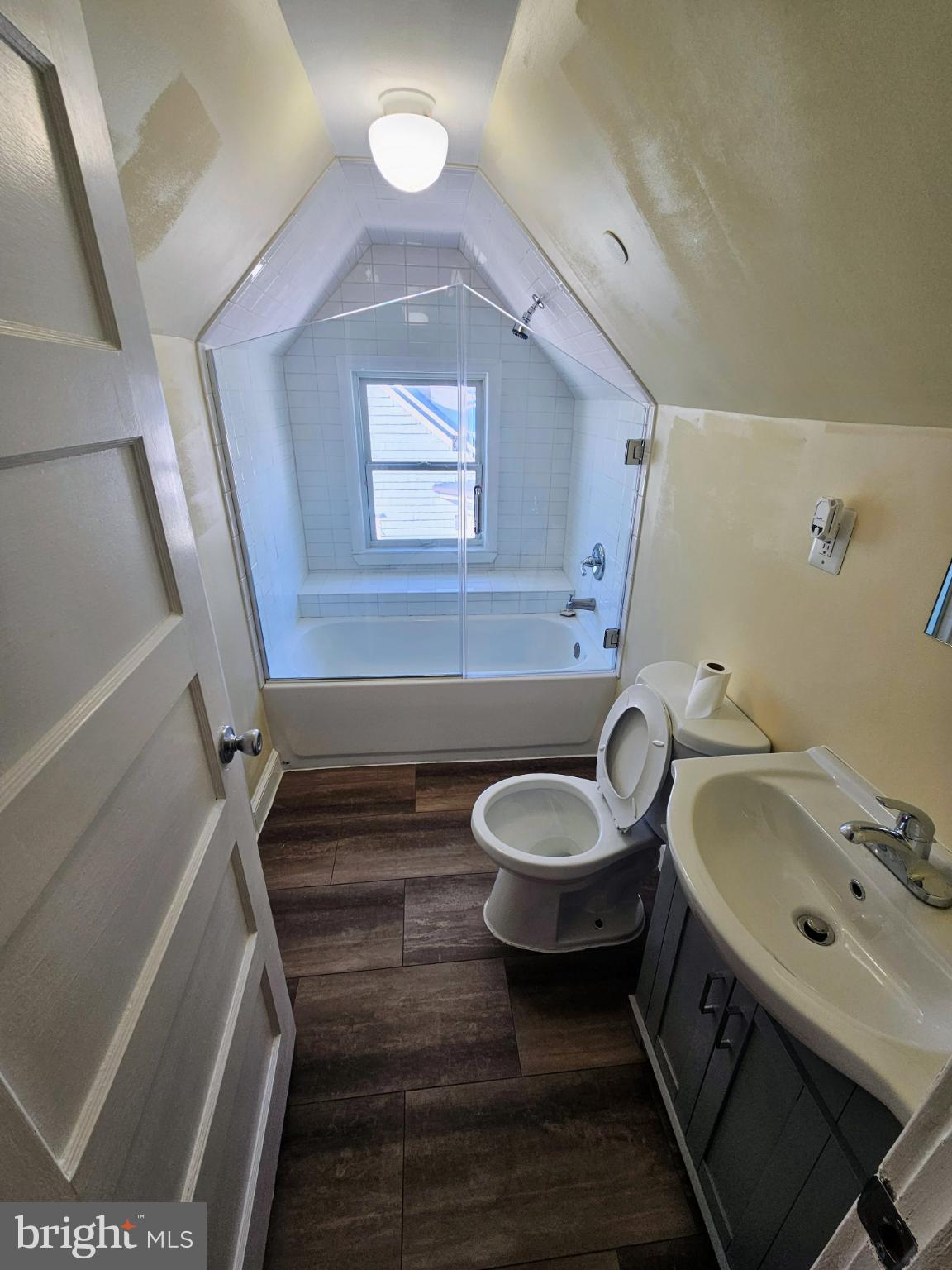 912 Riverside Avenue, Unit 3 Trenton, NJ 08618 - Photo 15 of 17 a bathroom with a sink and a mirror