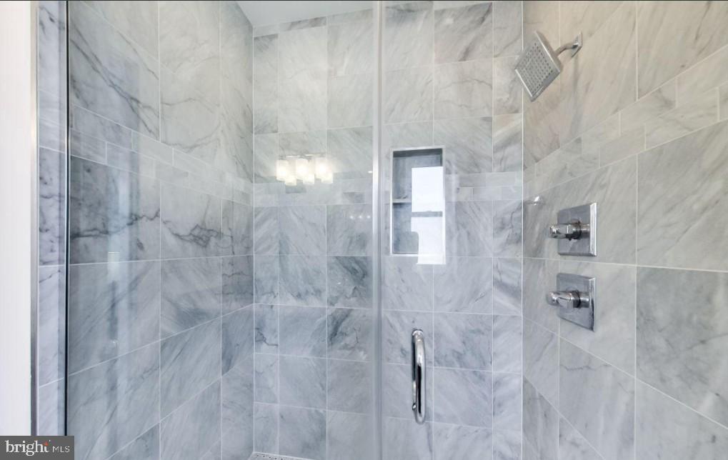 726 Girard Street Northwest, Unit 2 Washington, DC 20001 - Photo 14 of 18 a bathroom with a shower