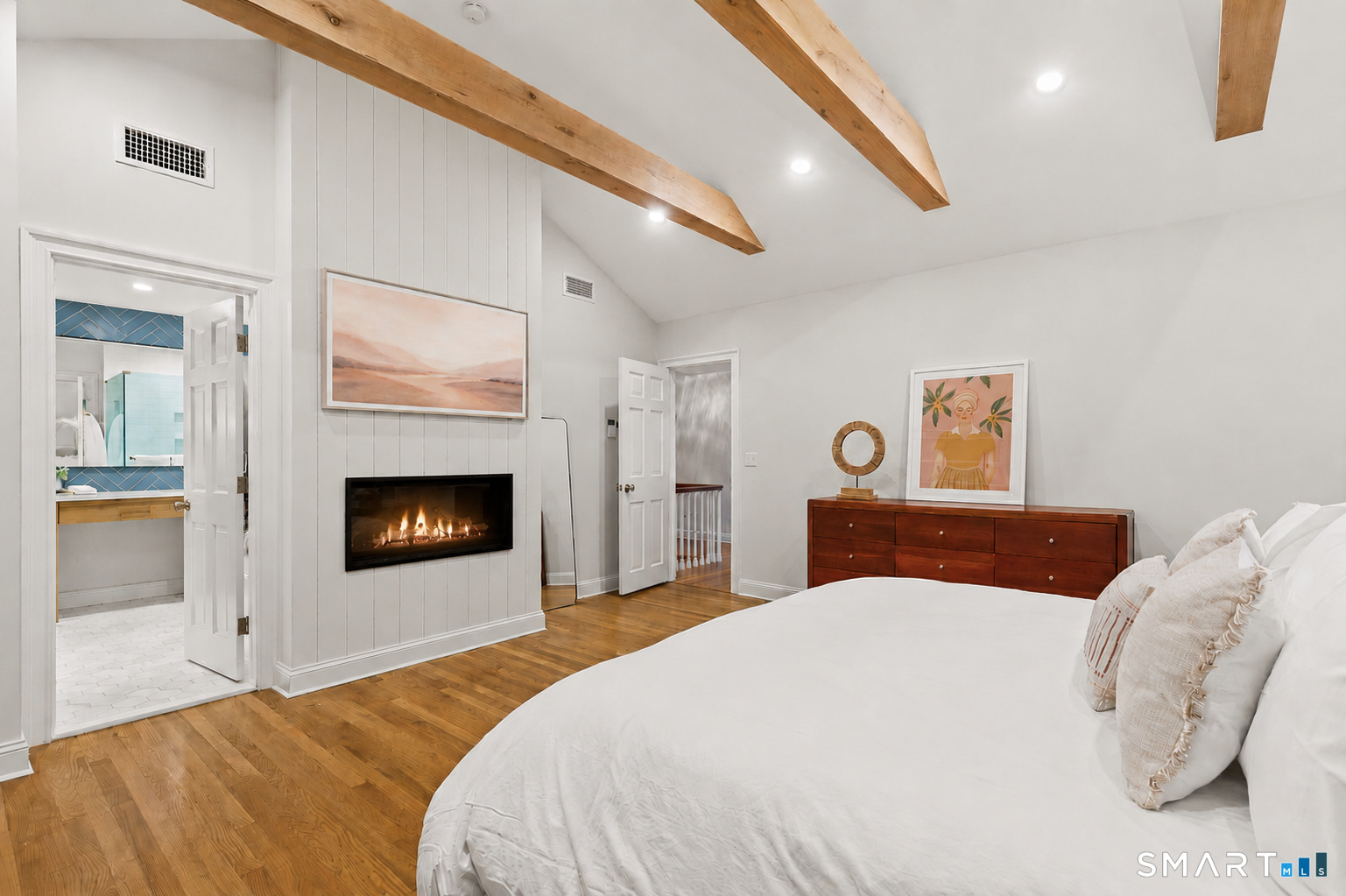 599 North Wilton Road New Canaan, CT 06840 - Photo 18 of 37 Primary bedroom suite w/ gas fireplace