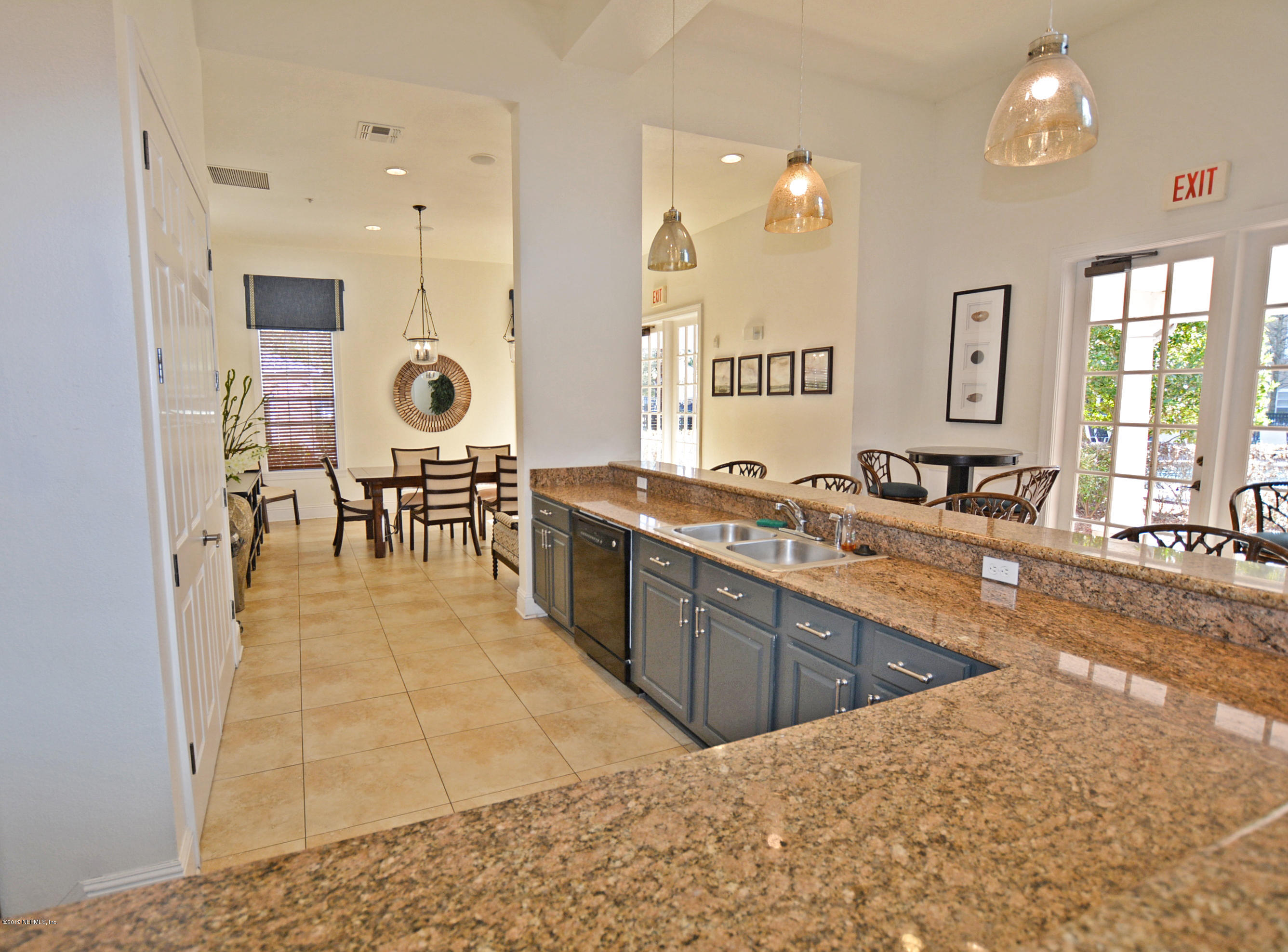 8550 Touchton Road, Unit 124 Jacksonville, FL 32216 - Photo 21 of 36 Clubhouse kitchen and dining area