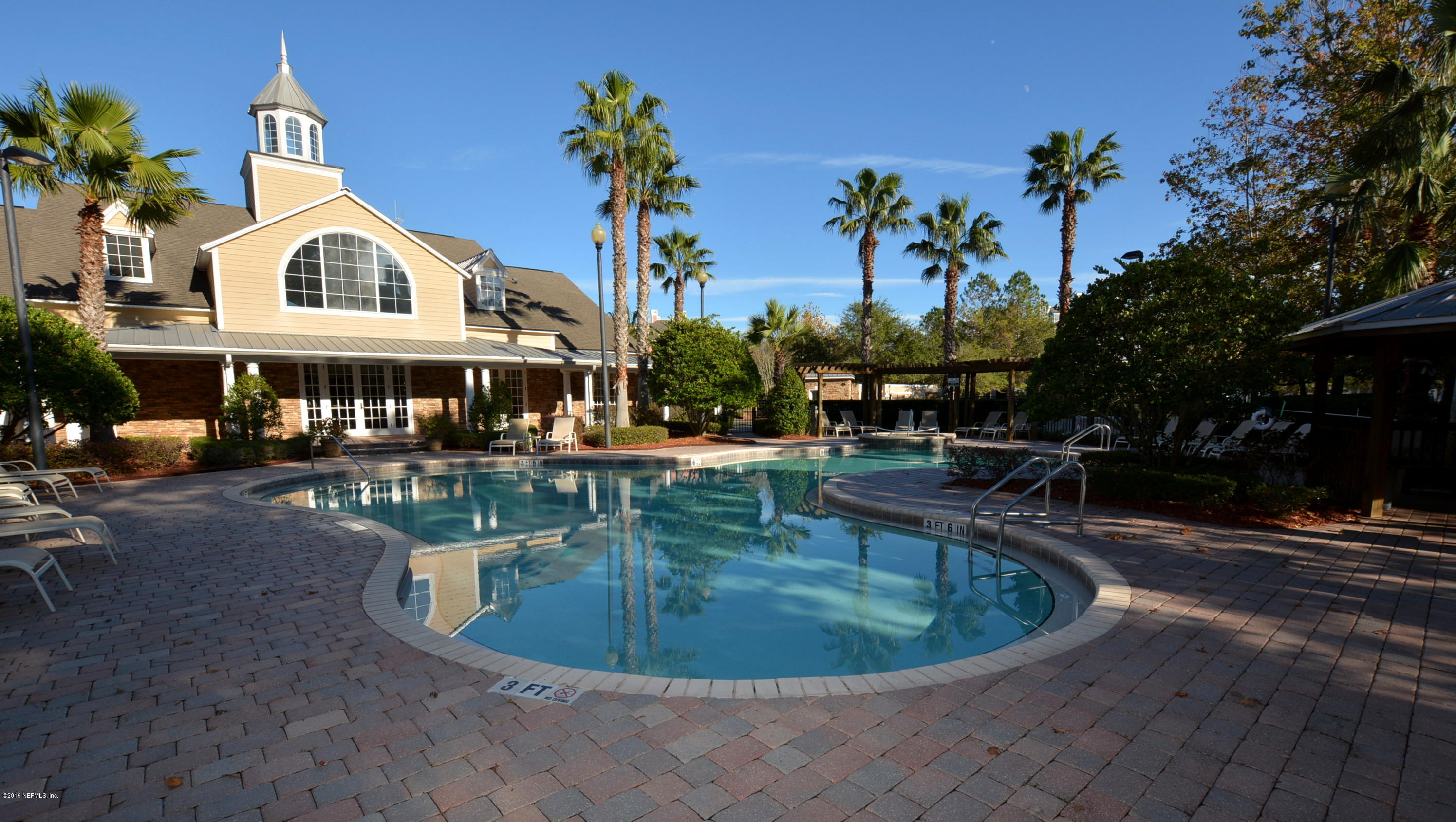 8550 Touchton Road, Unit 124 Jacksonville, FL 32216 - Photo 30 of 36 Pool with clubhouse view