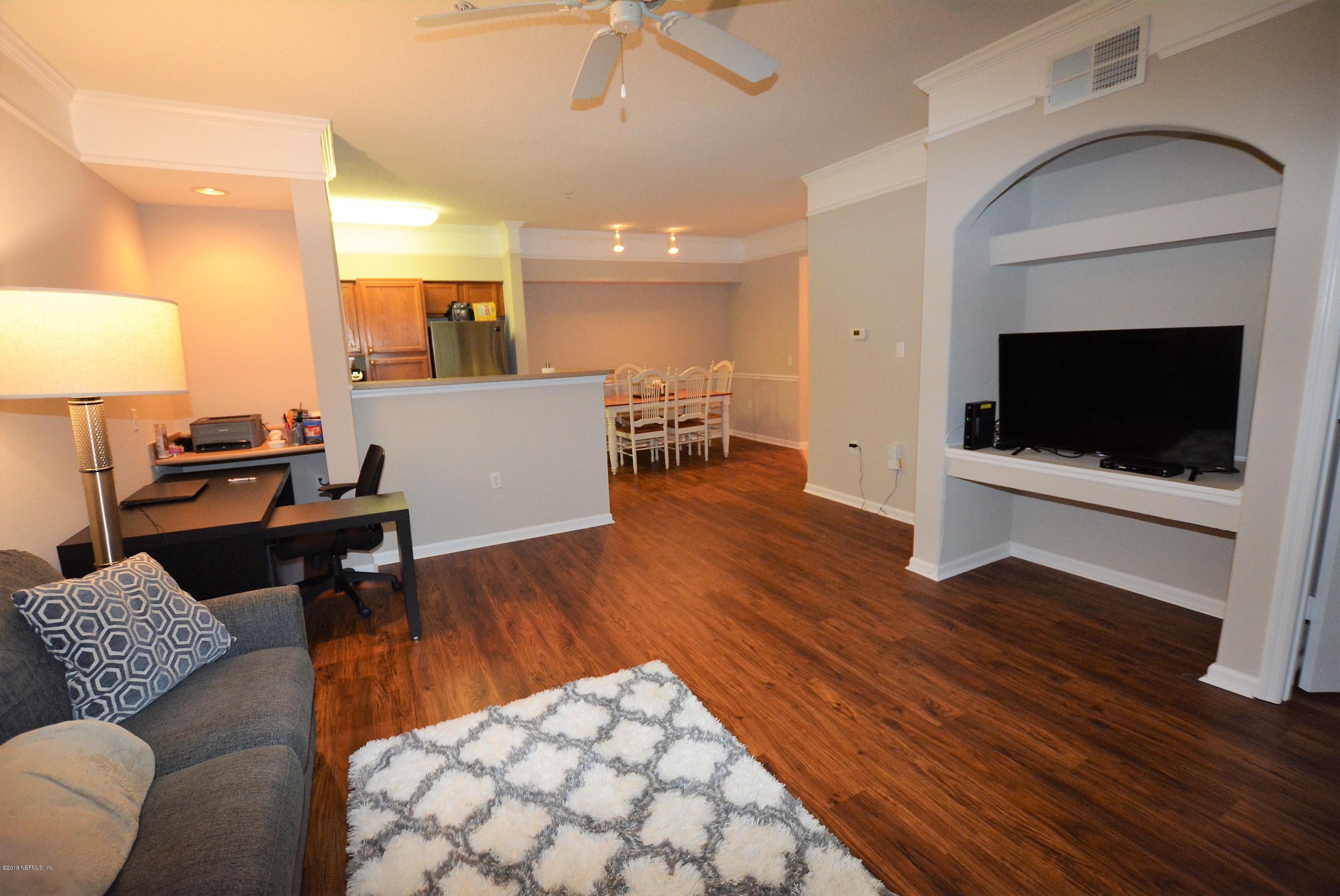 8550 Touchton Road, Unit 124 Jacksonville, FL 32216 - Photo 36 of 36 Ent built ins and open floorplan
