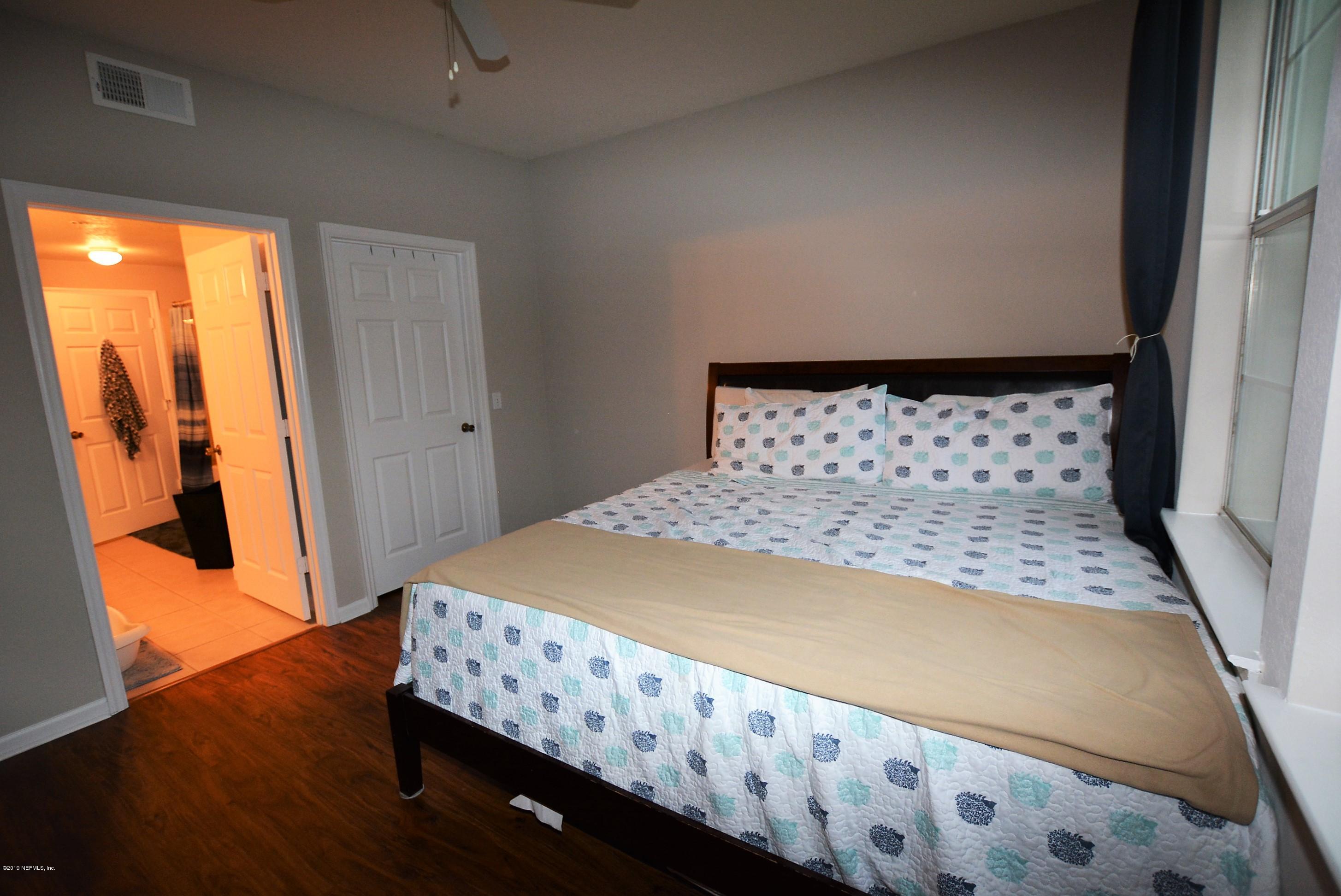 8550 Touchton Road, Unit 124 Jacksonville, FL 32216 - Photo 9 of 36 Lg master w/ luxury vinyl floors