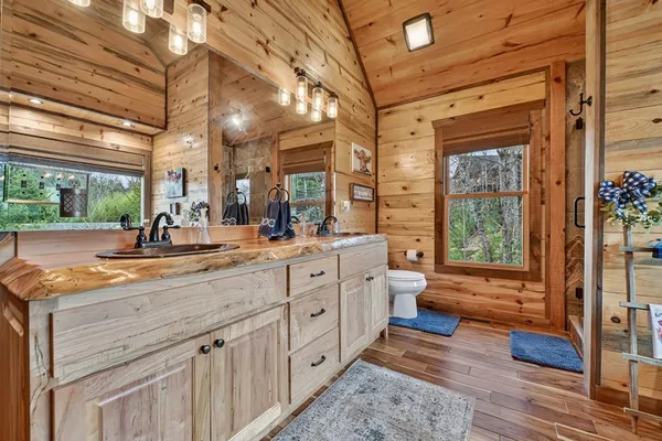 a bathroom with a bathtub and shower