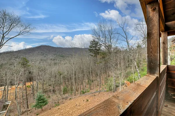 an aerial view of a house with outdoor space