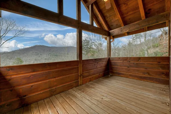 an aerial view of a house with outdoor space