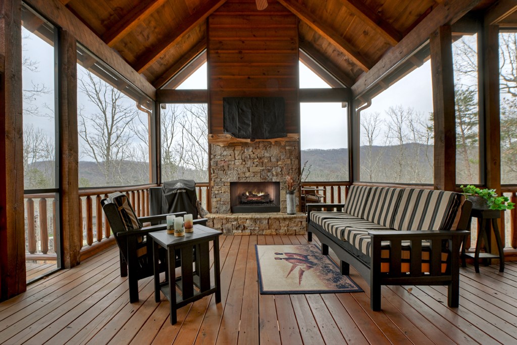 467 Deer Crest Road Blue Ridge, GA 30513 - Photo 46 of 79 a view of a dining room with furniture window and wooden floor