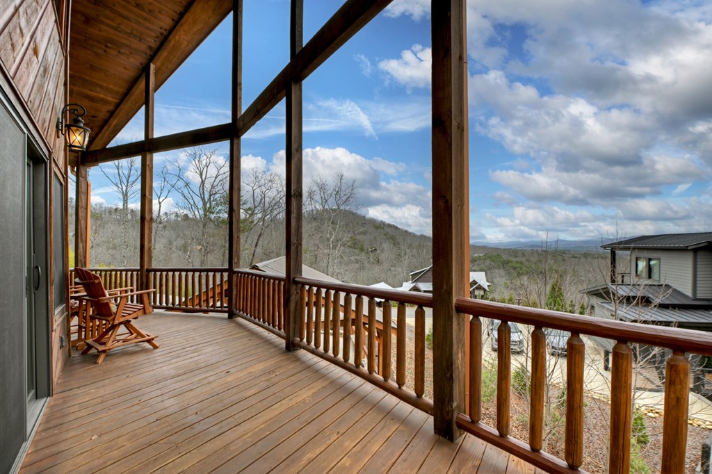 467 Deer Crest Road Blue Ridge, GA 30513 - Photo 49 of 79 a view of a balcony with wooden floor