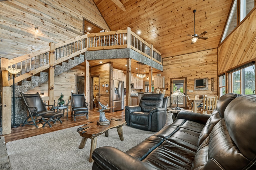 467 Deer Crest Road Blue Ridge, GA 30513 - Photo 9 of 79 a view of a livingroom with furniture and a couch