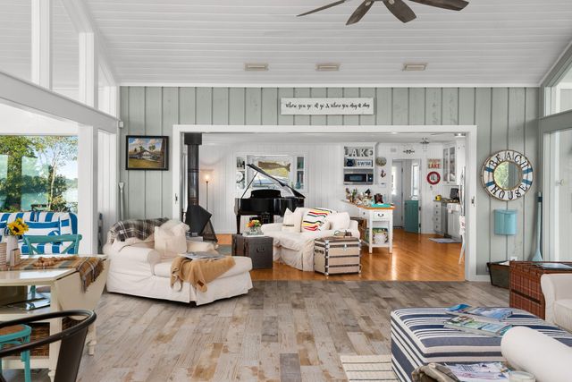a kitchen with stainless steel appliances a stove a sink and a refrigerator