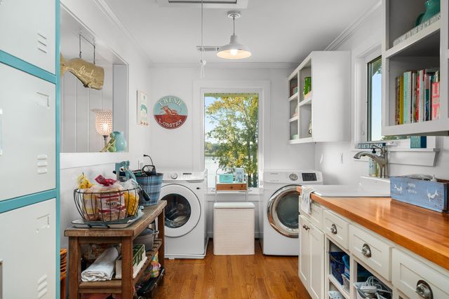 a living room with furniture and a mirror