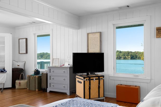 a view of houses with swimming pool