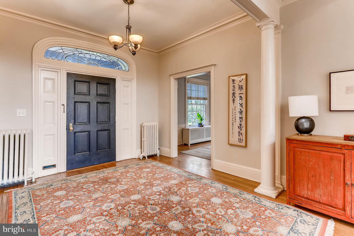 Foyer opens to living and dining rooms