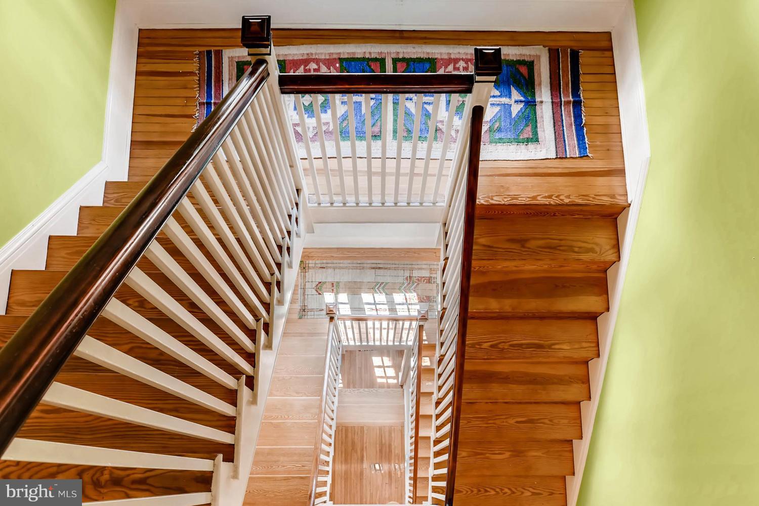 203 Longwood Road Baltimore, MD 21210 - Photo 27 of 30 Grand stairwell from 3rd to 1st floor