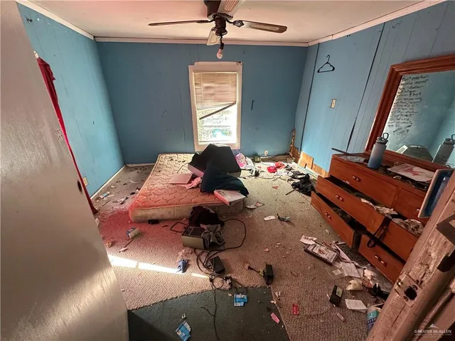 a kitchen with a sink appliances and cabinets