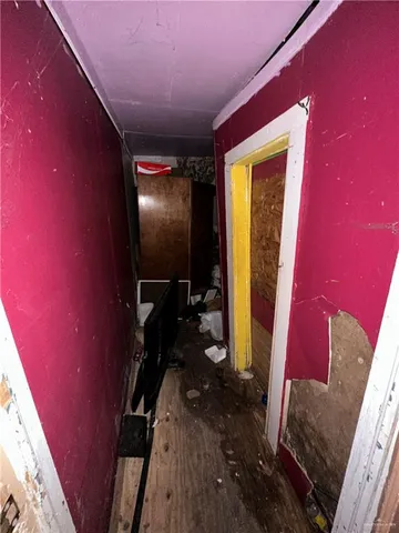 a room with furniture and musical instruments