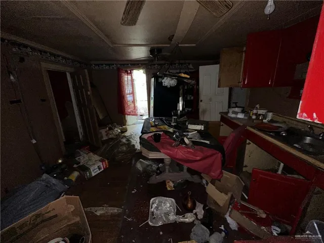 a room with furniture and wooden floor