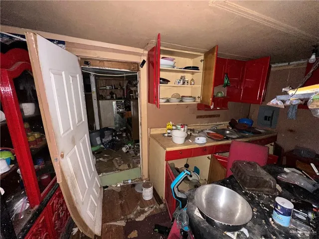 a backyard of a house with outdoor seating