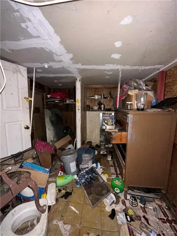 a picture of a room with furniture and a window