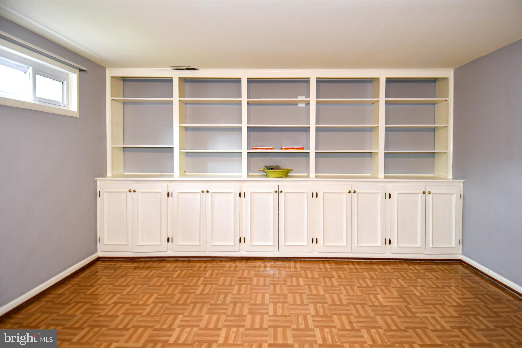8916 Battery Road Alexandria, VA 22308 - Photo 28 of 53 Built in Shelves & Cabinets in 4th Lvl Rec Room.