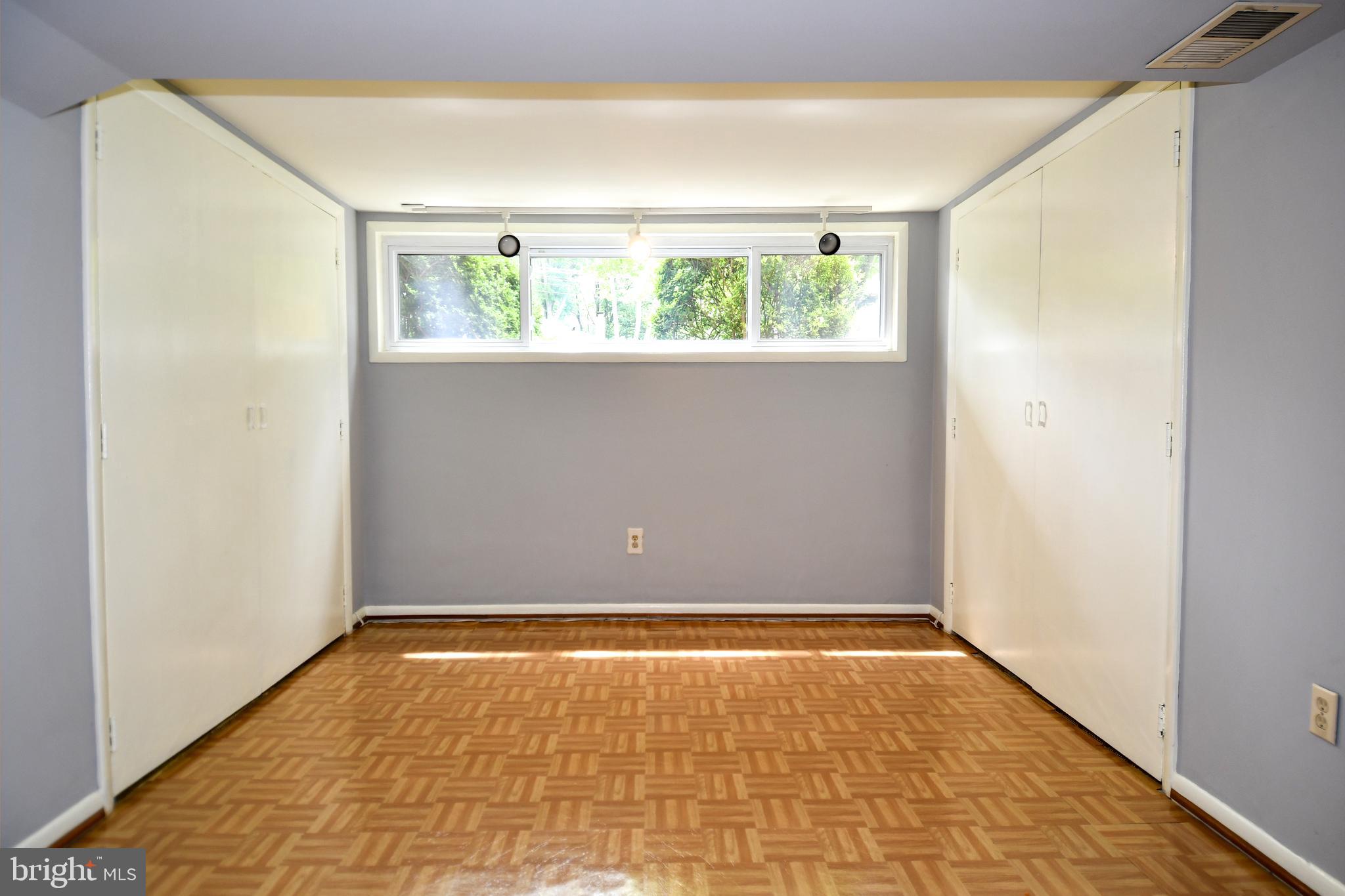 8916 Battery Road Alexandria, VA 22308 - Photo 29 of 53 View of other end of Rec Rm! Storage on both sides