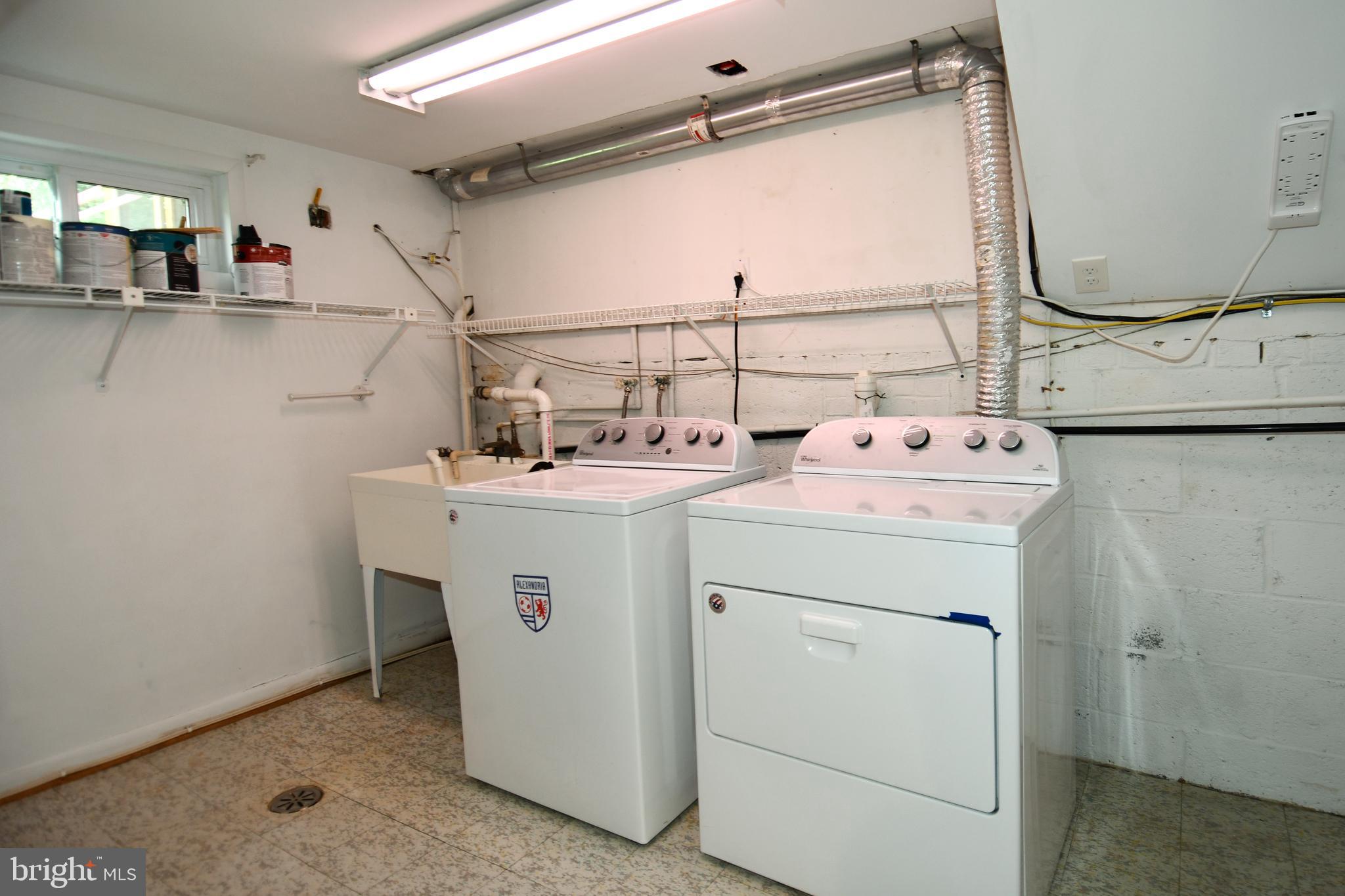 8916 Battery Road Alexandria, VA 22308 - Photo 31 of 53 Laundry rm w storage, shelves, window & electric.