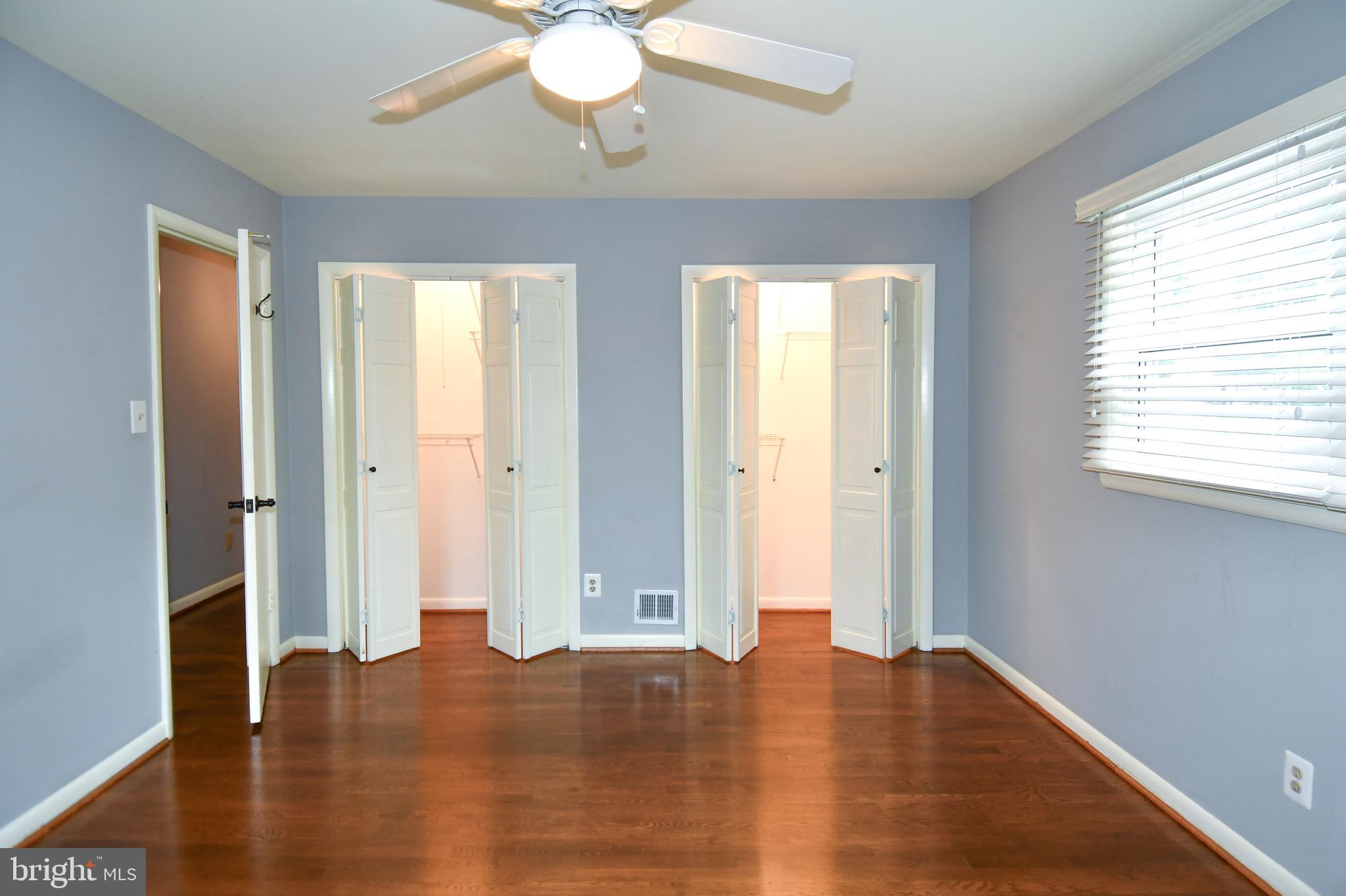 8916 Battery Road Alexandria, VA 22308 - Photo 35 of 53 Primary bedroom with 2 closets and lights.