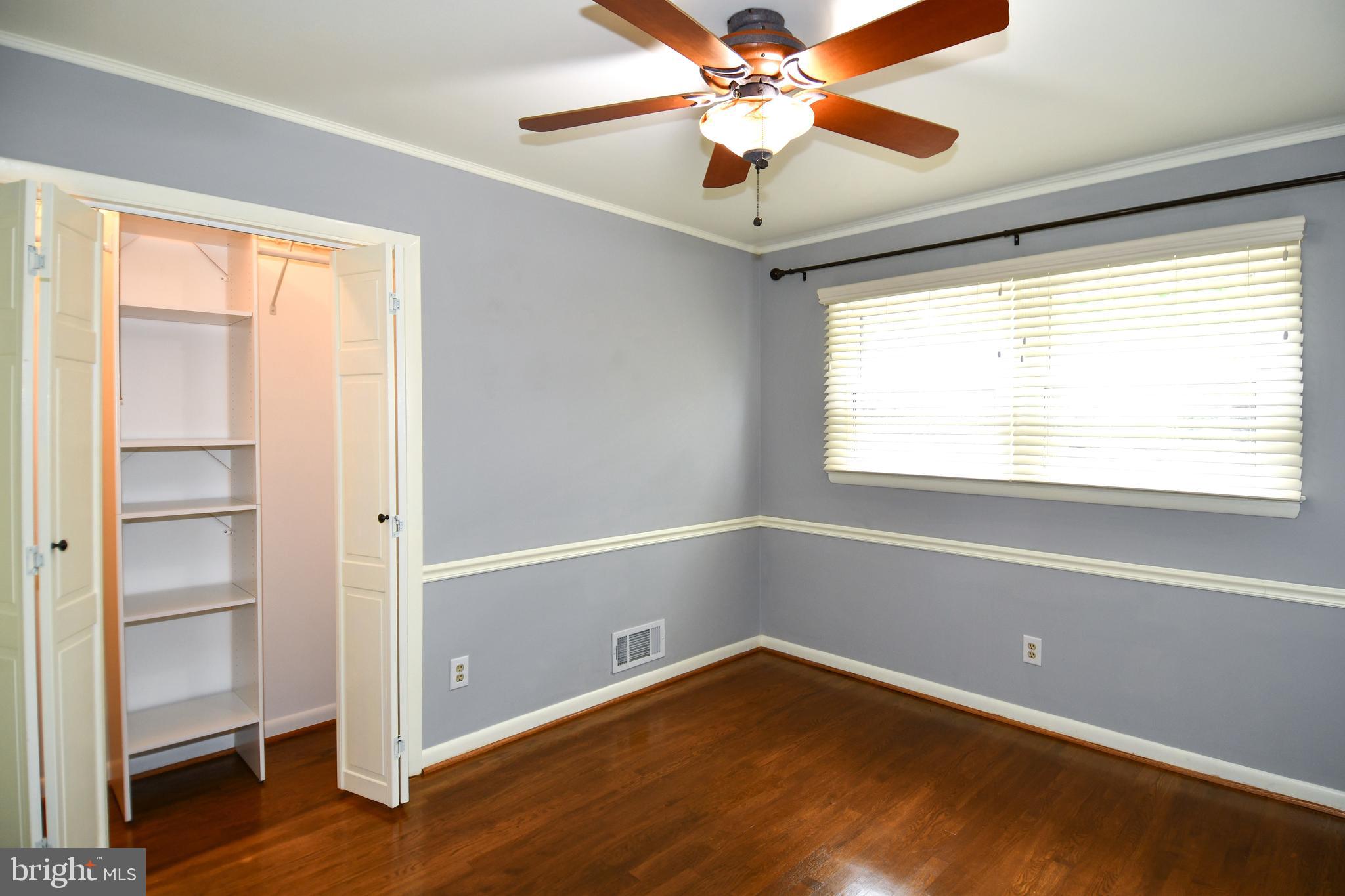 8916 Battery Road Alexandria, VA 22308 - Photo 40 of 53 3rd bdrm w HW flrs & built-ins in closet w light.