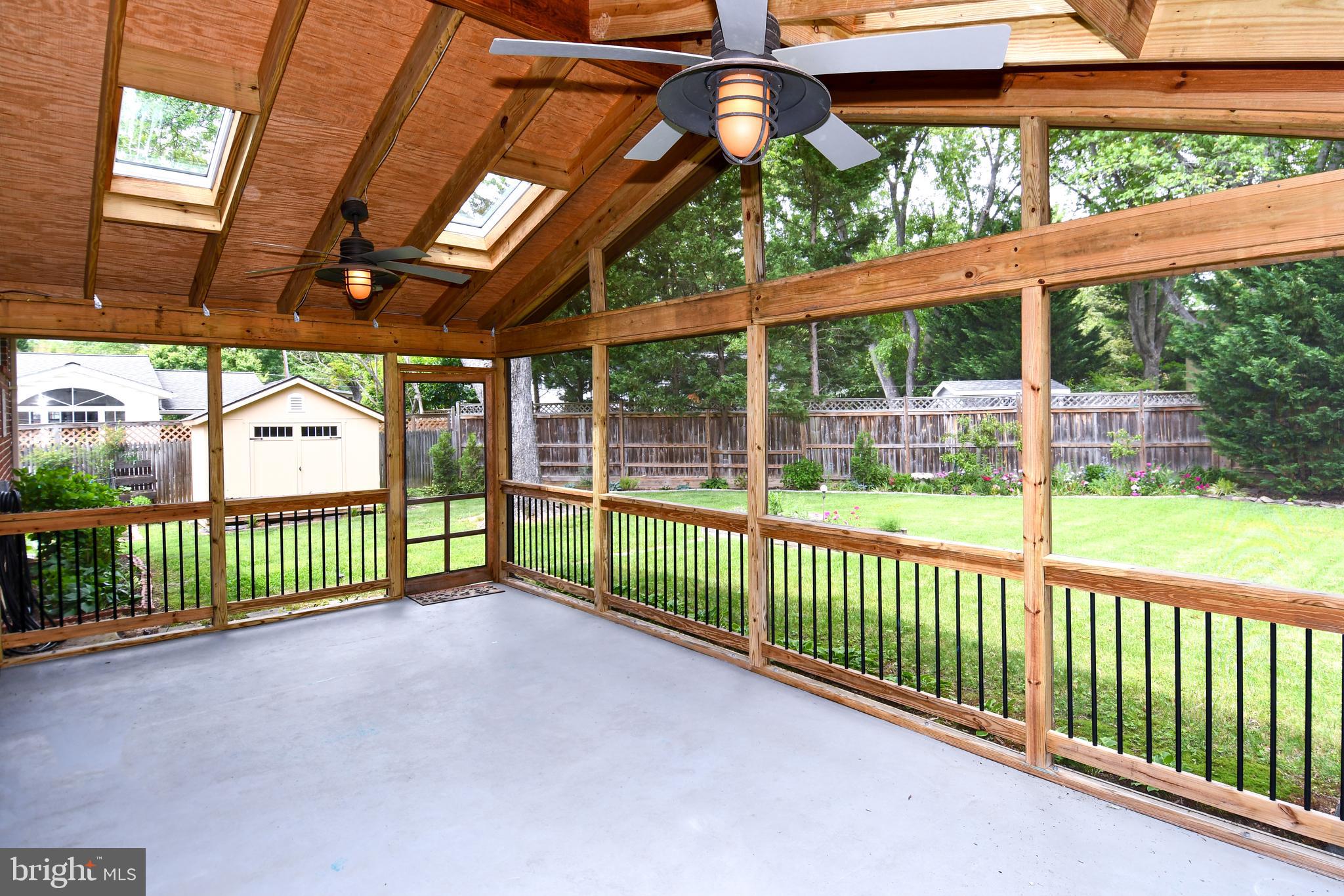 8916 Battery Road Alexandria, VA 22308 - Photo 45 of 53 2 ceiling fans w lights & 2 exits on either side.
