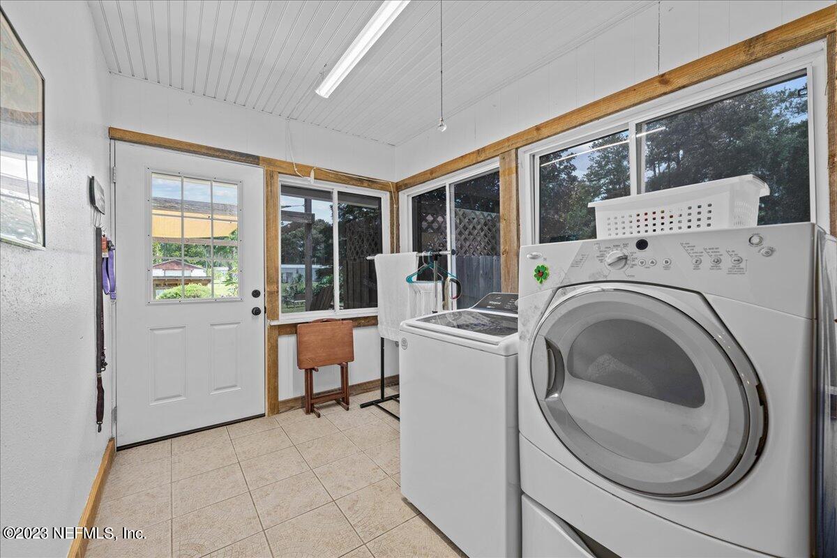 108 Creekside Road Satsuma, FL 32189 - Photo 18 of 40 a view of a storage & utility room with washer and dryer