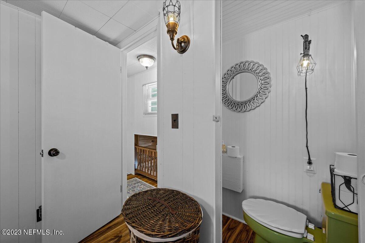 108 Creekside Road Satsuma, FL 32189 - Photo 24 of 40 a bathroom with a toilet a sink and a shower