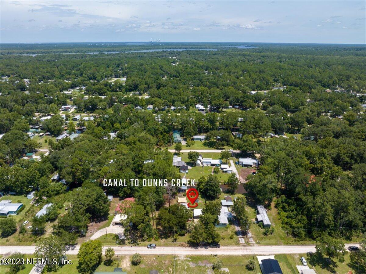 108 Creekside Road Satsuma, FL 32189 - Photo 37 of 40 an aerial view of residential houses with outdoor space and trees