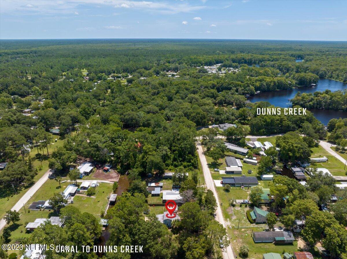 108 Creekside Road Satsuma, FL 32189 - Photo 38 of 40 an aerial view of residential houses with outdoor space and trees