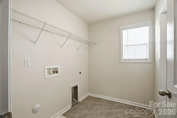 a view of a room that has a window in it